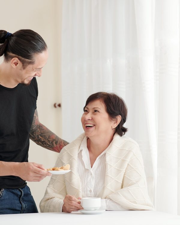 Caring welcoming adult son